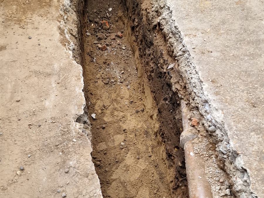 Deep foundation trench excavated for new footings